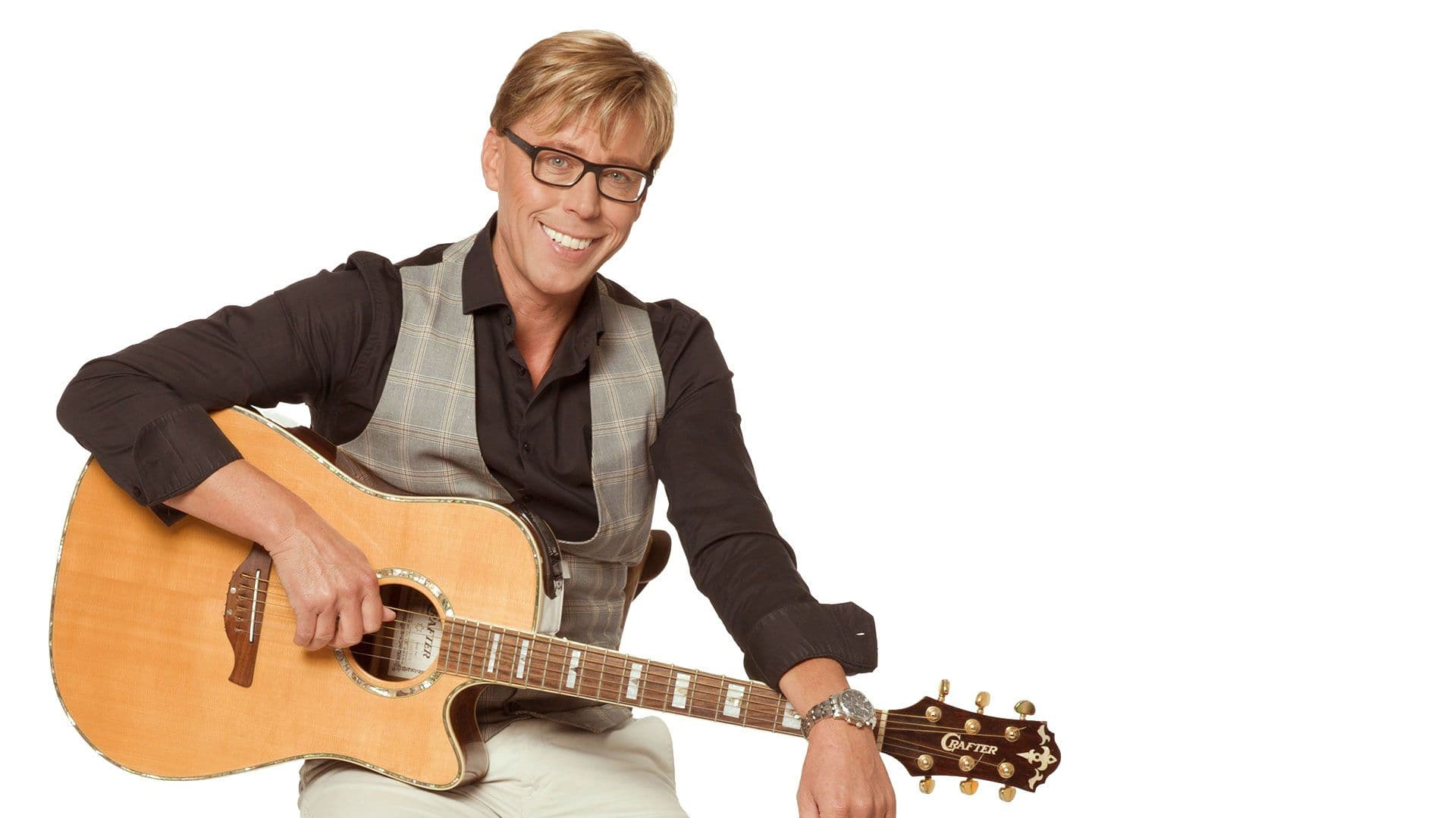 Hansy Vogt mit Akustikgitarre