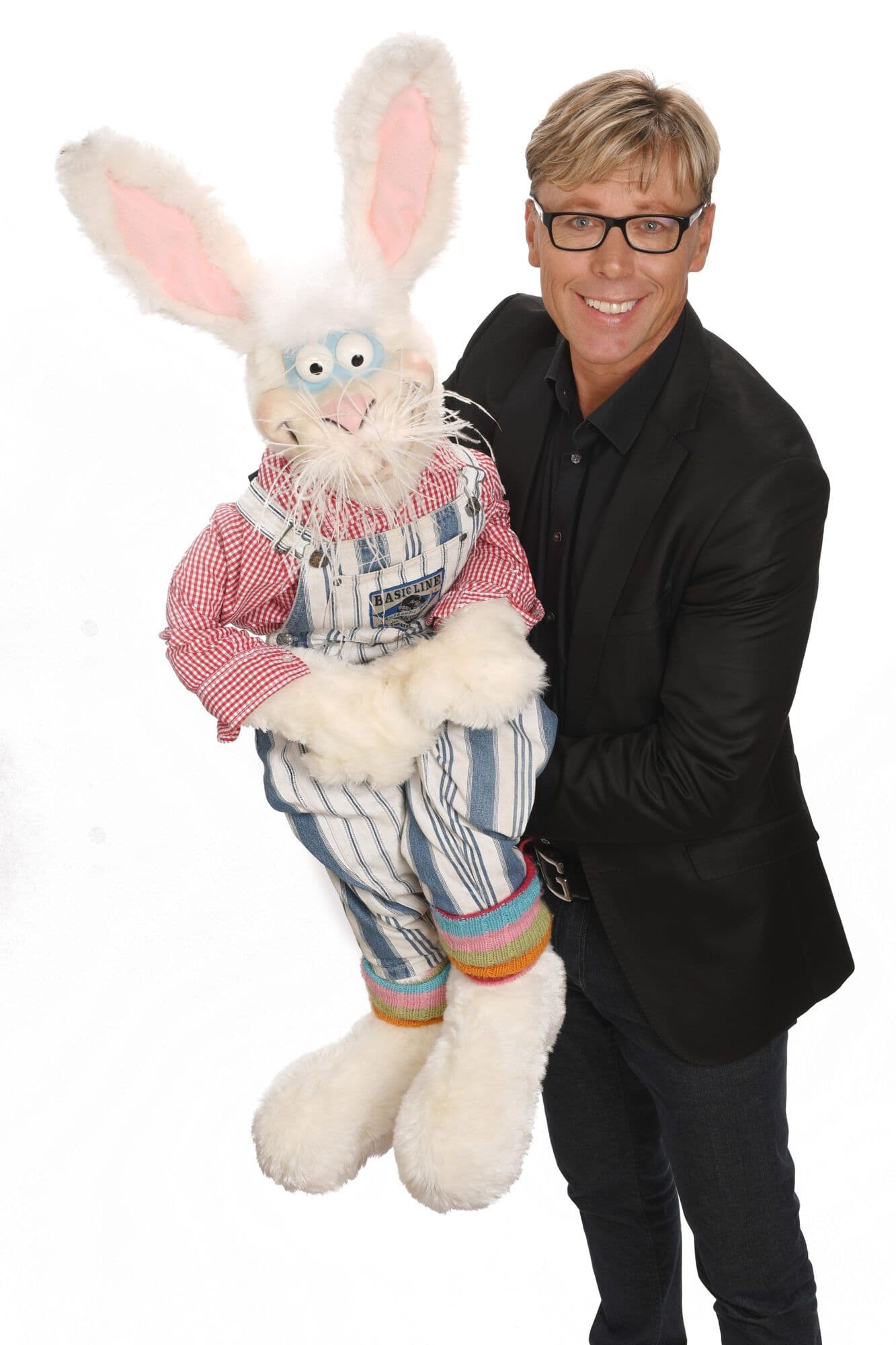 Studioporträt von Hansy Vogt mit Handpuppe